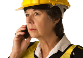 Image of a lady who is a fire warden on the phone